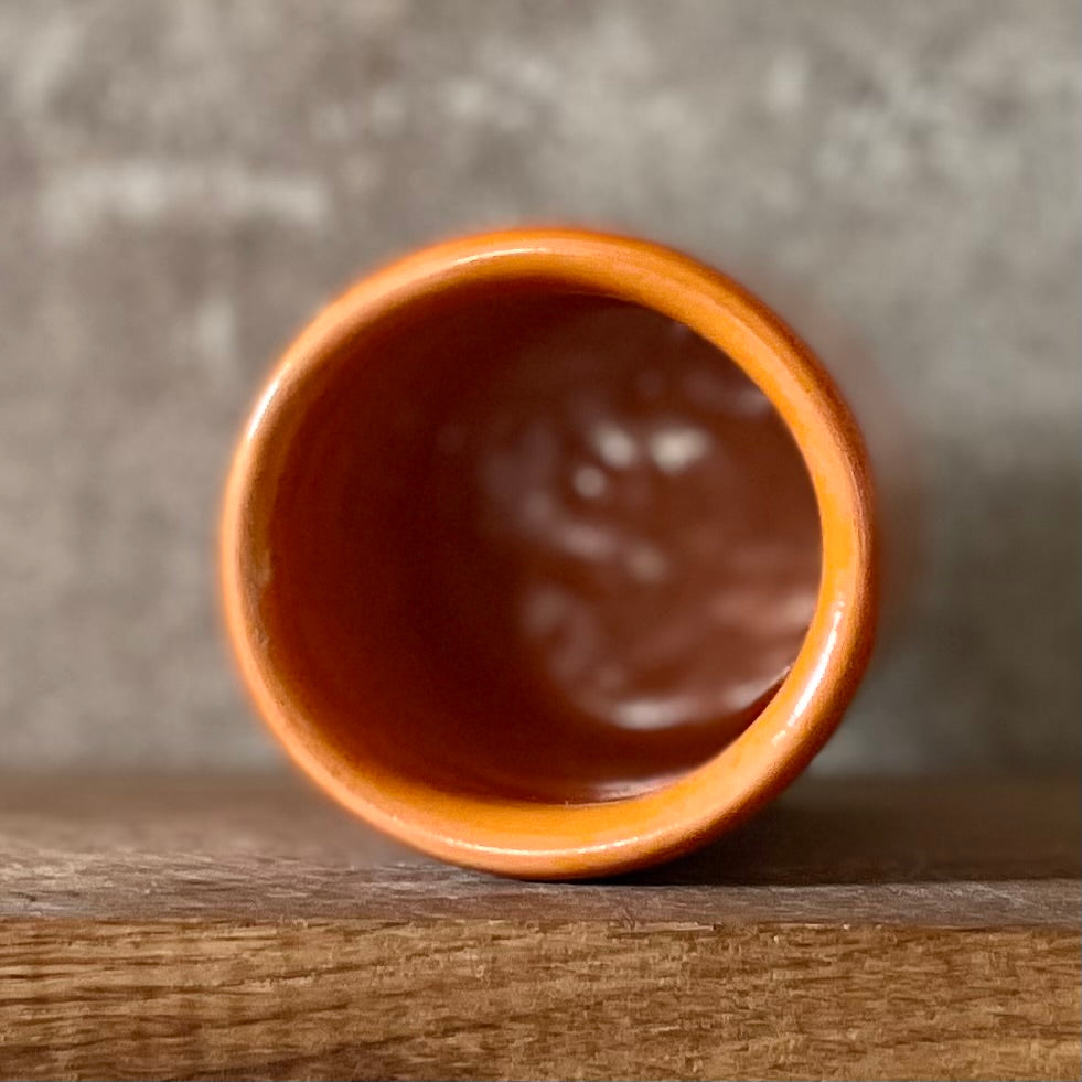 Bright orange mug with blessing