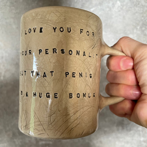 Brownish mug with funny saying