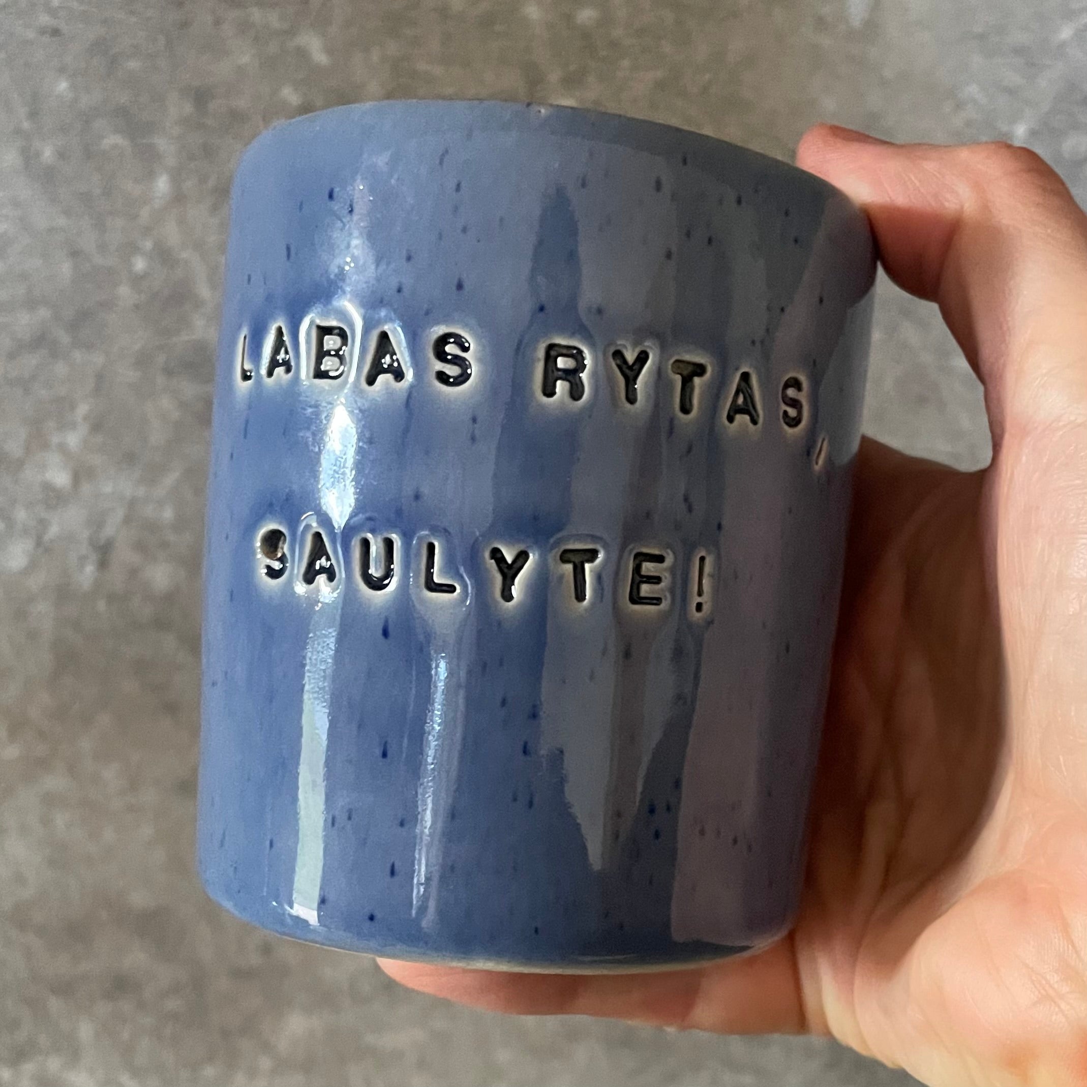 Ceramic mug with words in Lithuanian