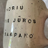 Speckled mug with saying in Lithuanian