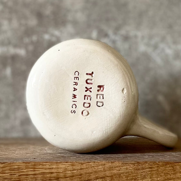 White mug with quote by Vergil