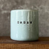 Pale blue ceramic mug "DABAR IR ČIA"