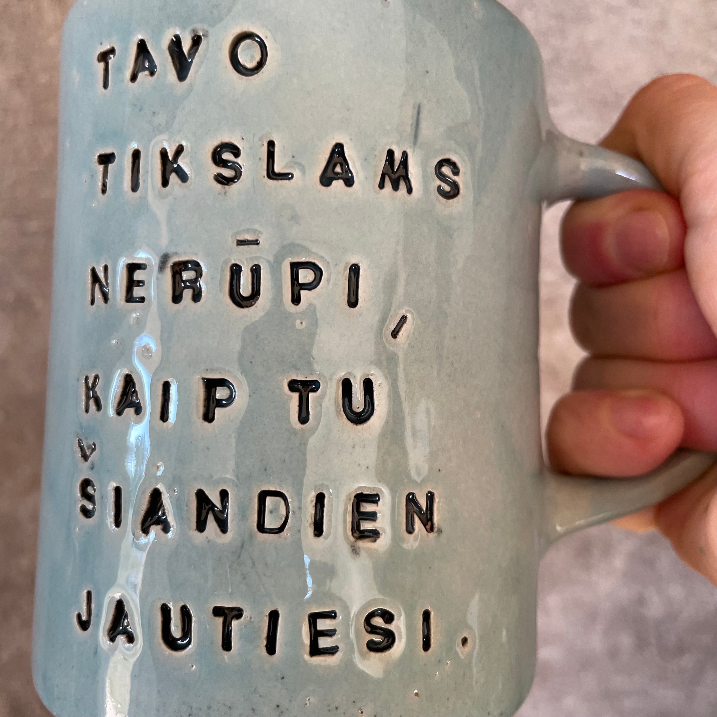 Blue mug with quote about goals