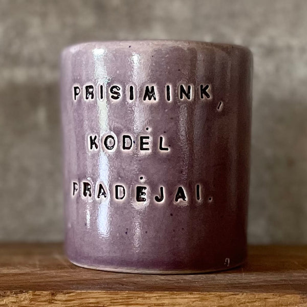 Purple mug with saying in Lithuanian