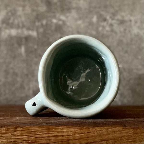 Mažas puodelis su smagiu užrašu