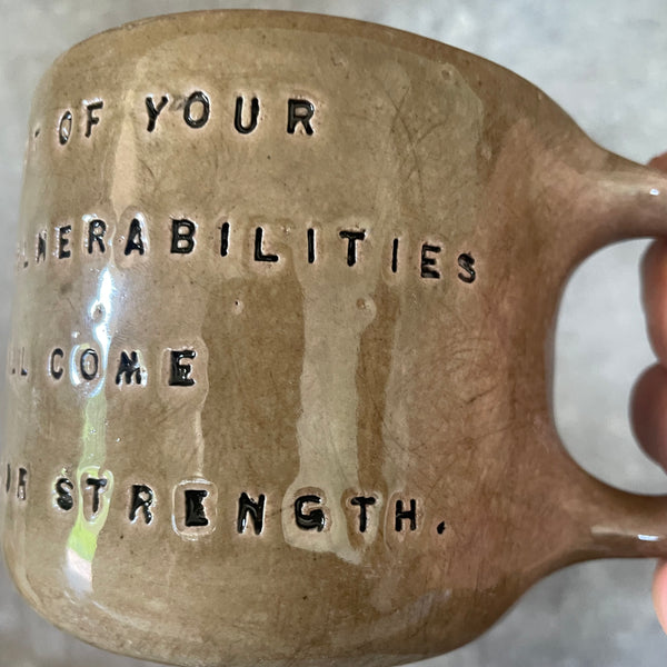 Brown mug with quote by S. Freud