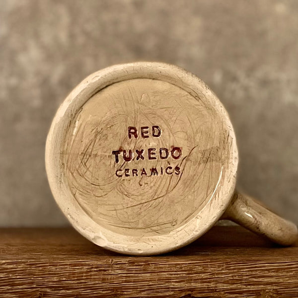 Beige large handmade ceramic mug with saying about peace