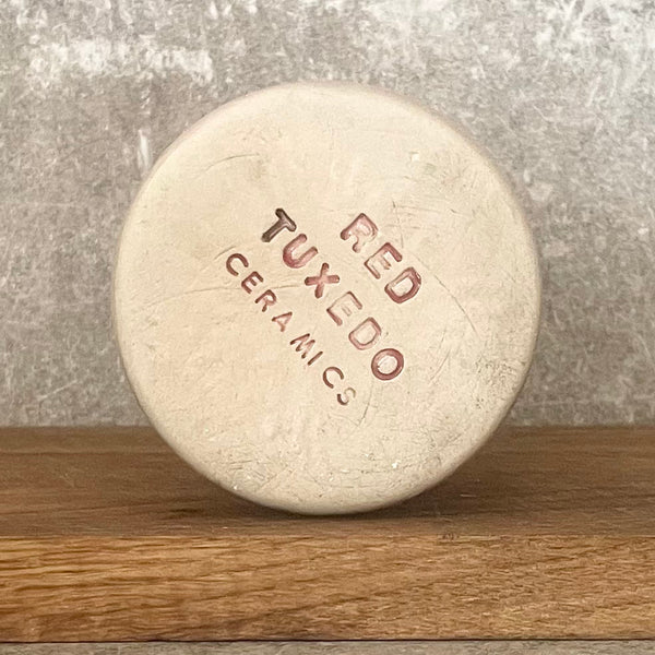 Ranku darbo puodelis su uzrasu