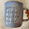 Blue ceramic mug with love words