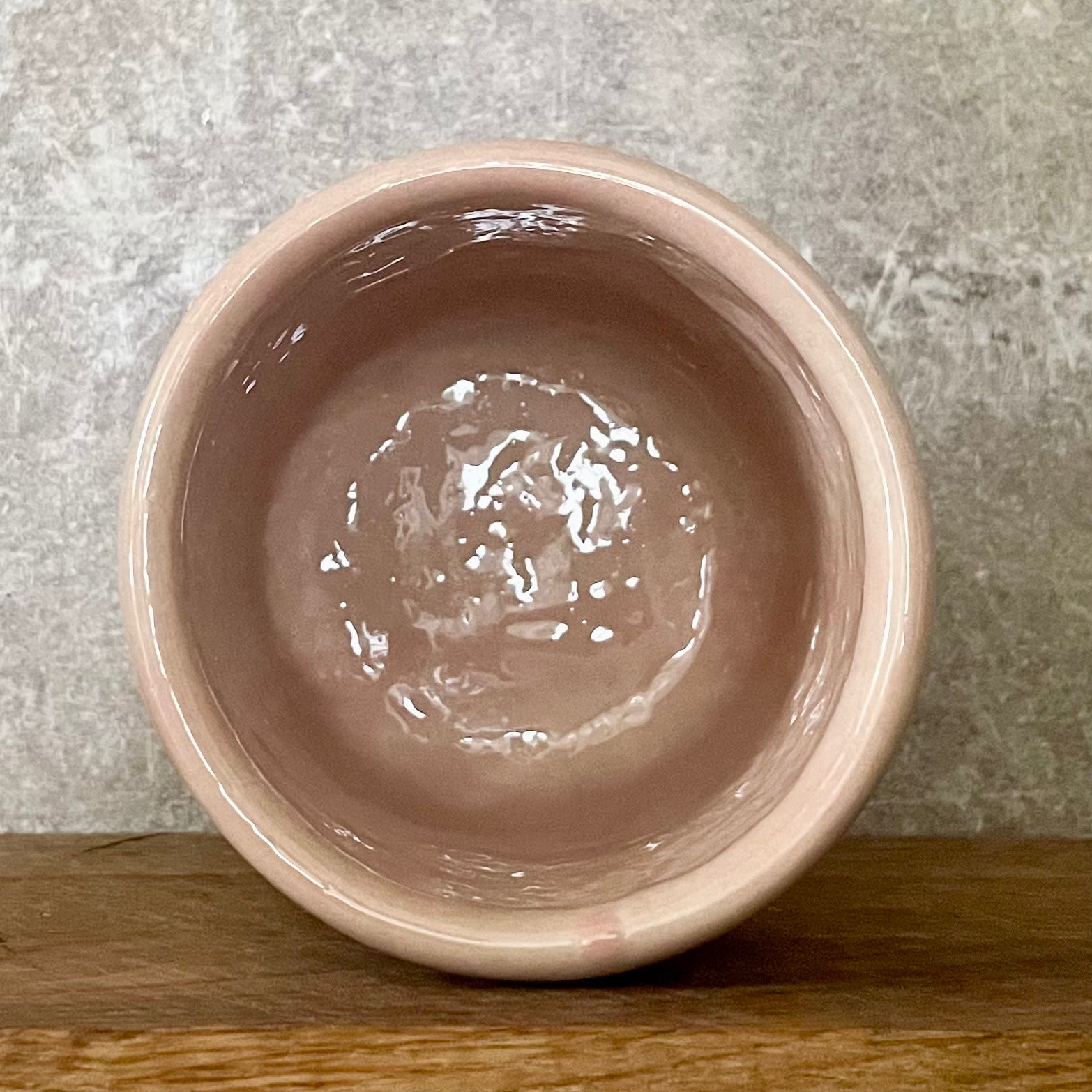 Big pink stoneware mug without handle