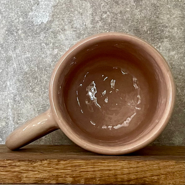 Big heavy mug with saying in Spanish