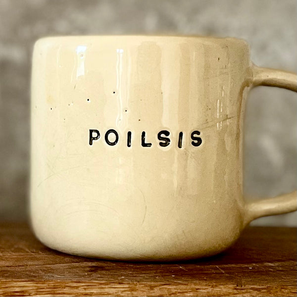 Ceramic mug with word POILSIS
