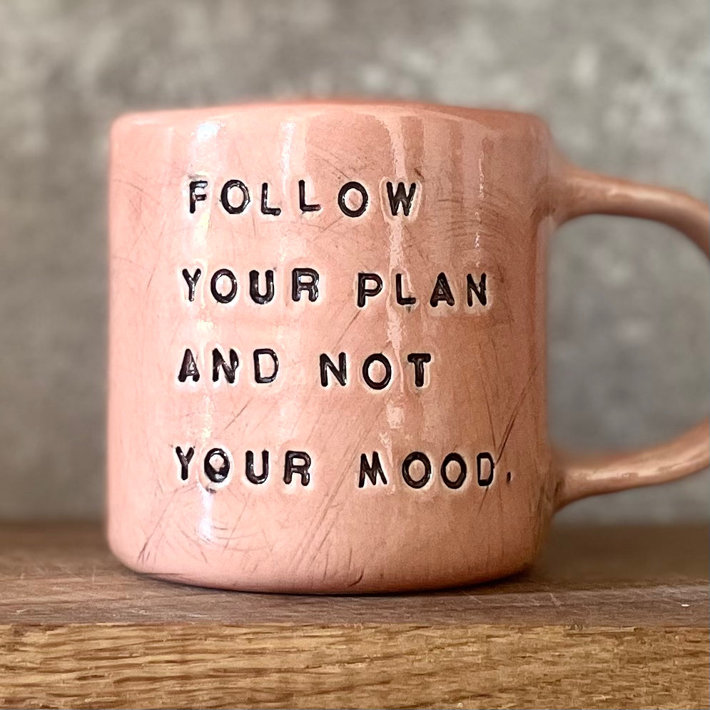 Pink mug with inspirational saying