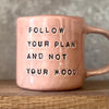 Pink mug with inspirational saying