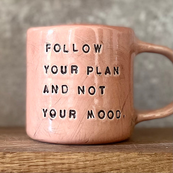 Pink mug with inspirational saying
