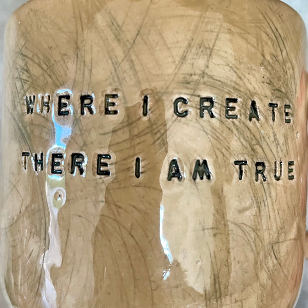 Ceramic mug with creativity quote