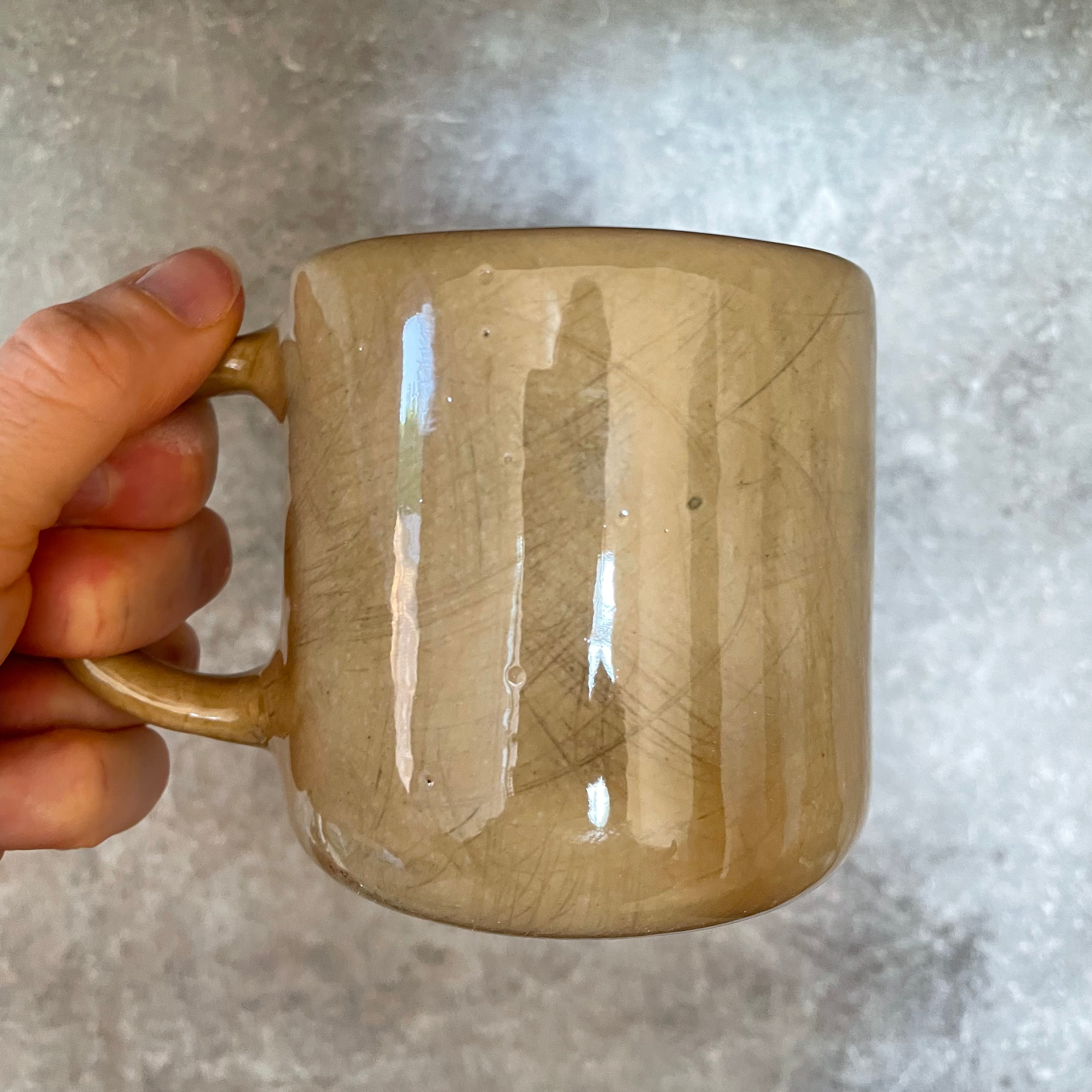 Brownish mug with sweet words in Lithuanian