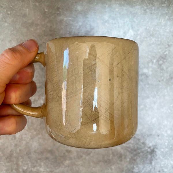 Brownish mug with sweet words in Lithuanian