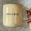 Ceramic mug with word POILSIS