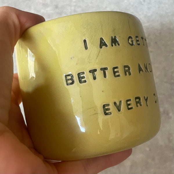 Yellow affirmation mug about healing and improving