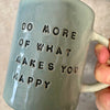 Pale blue coffee mug with inspirational saying