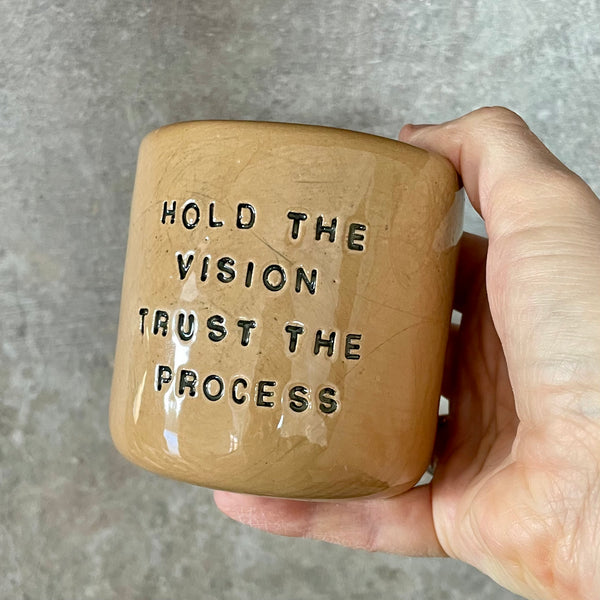 Brownish tumbler mug with inspirational words