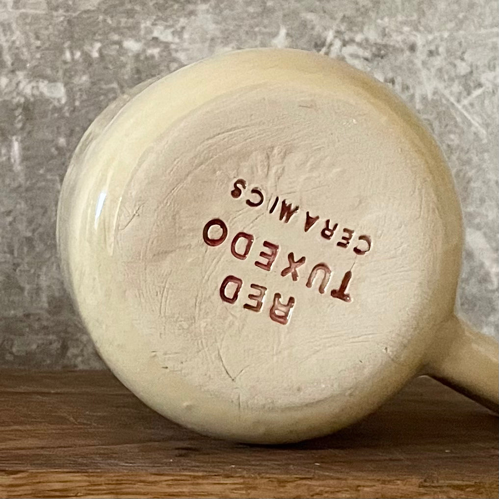 Ceramic mug with word POILSIS