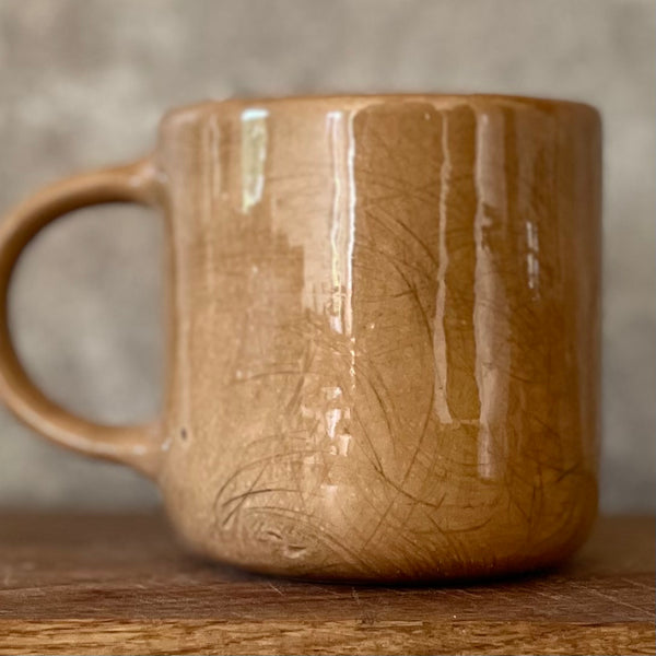 Brownish mug with lovely saying