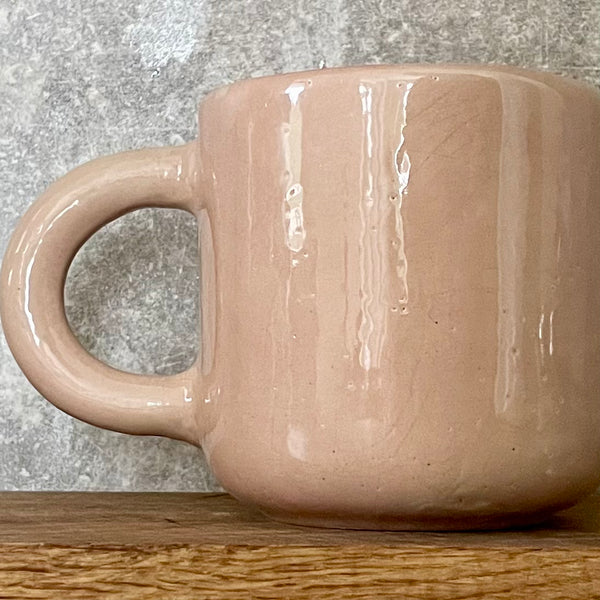 Big heavy mug with saying in Spanish