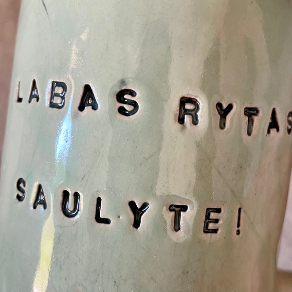 Ceramic mug with words in Lithuanian LABAS RYTAS, SAULYTE!