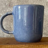 Blue ceramic mug with love words