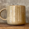Brownish mug with sweet words in Lithuanian