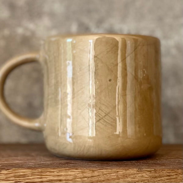 Brownish mug with sweet words in Lithuanian