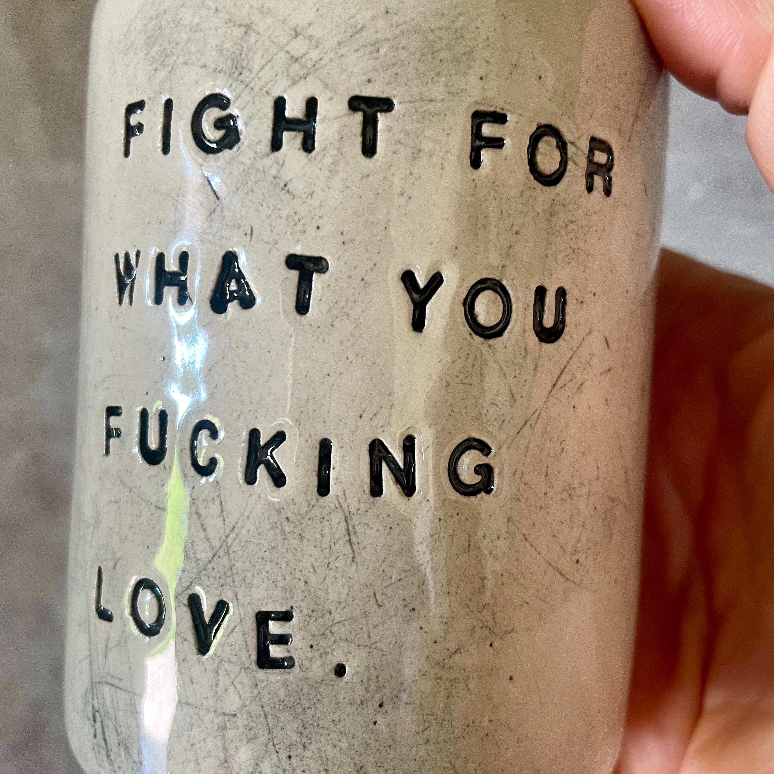 Puodelis be rankenos FIGHT