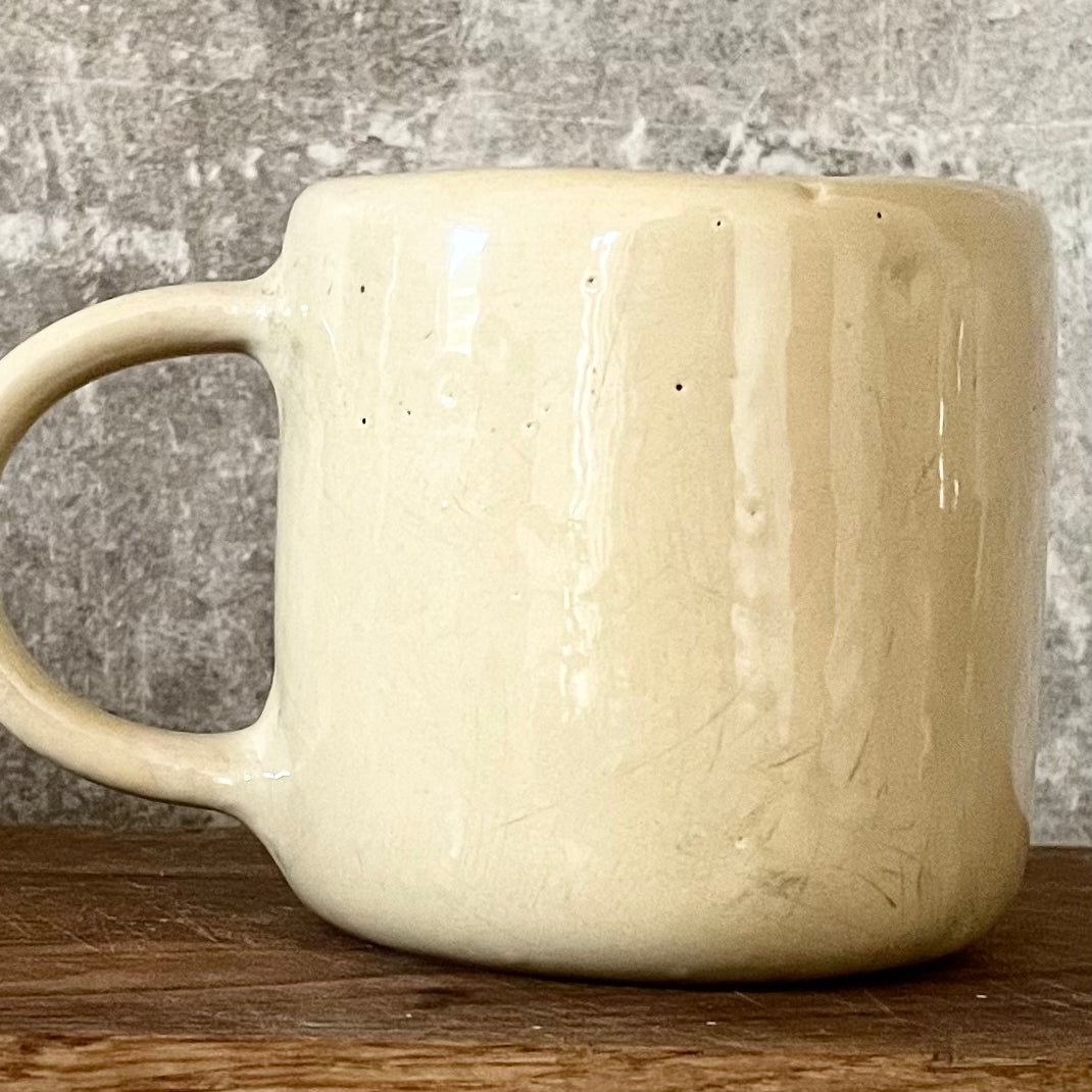 Ceramic mug with word POILSIS