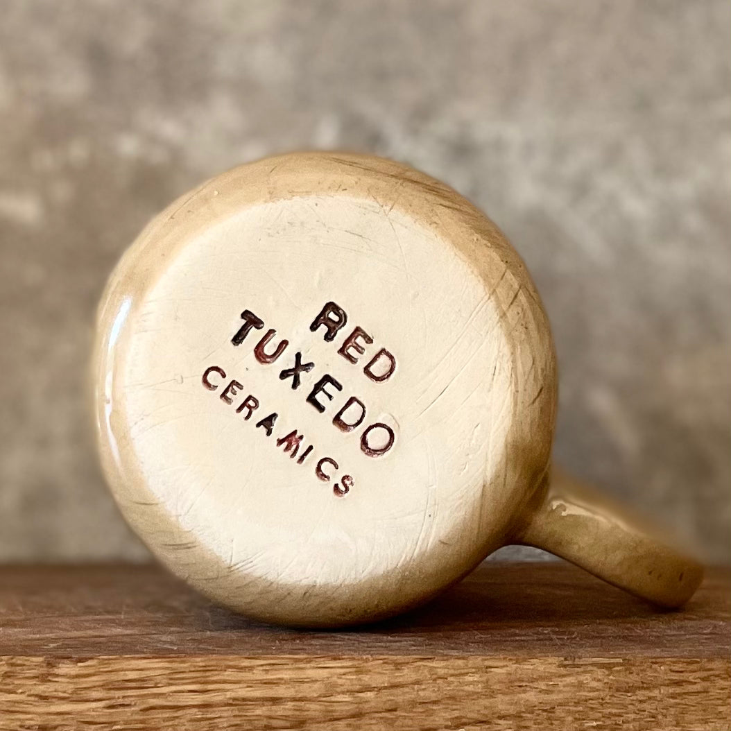 Brownish mug with sweet words in Lithuanian