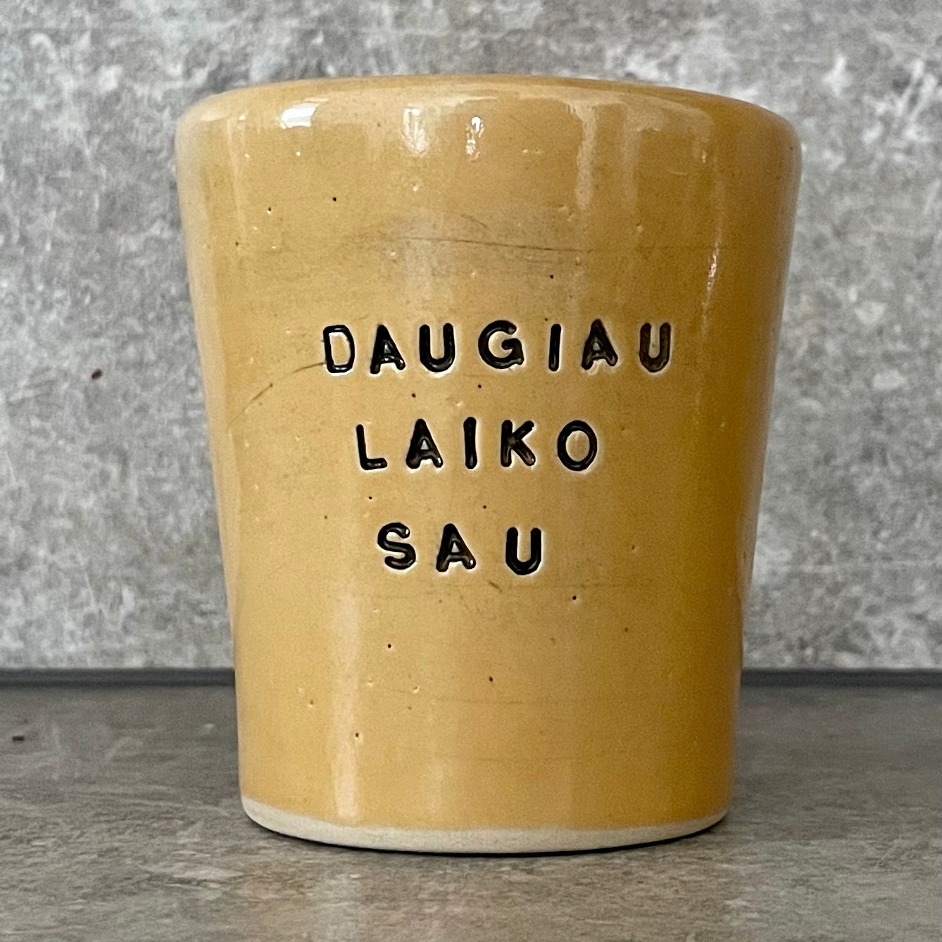 Tumbler mug with words in Lithuanian