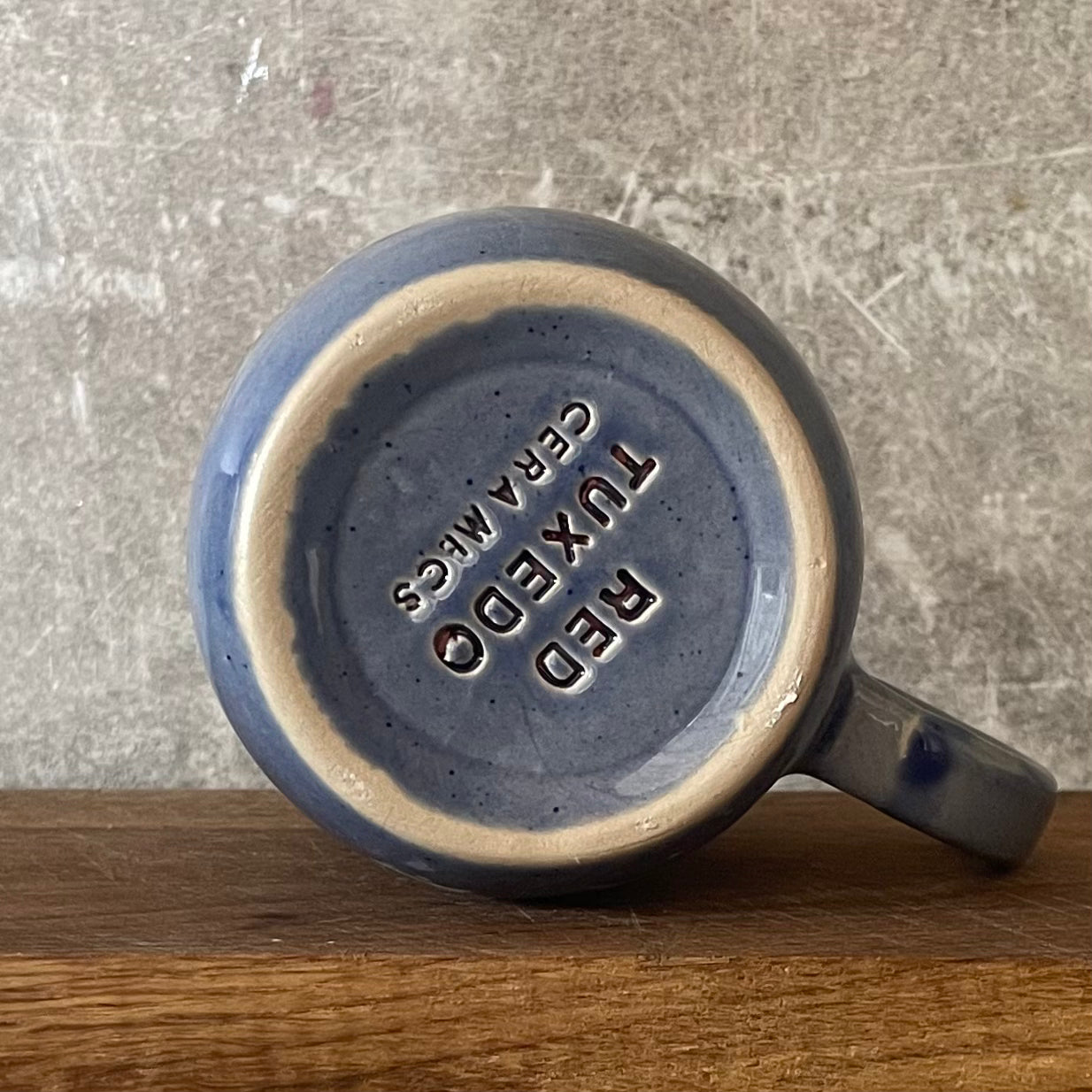 Blue ceramic mug with love words