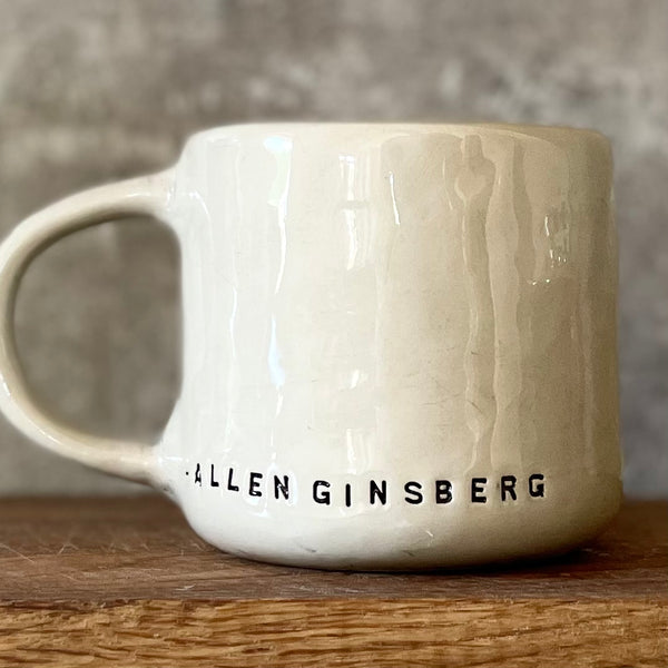 Ceramic coffee mug with writer quote