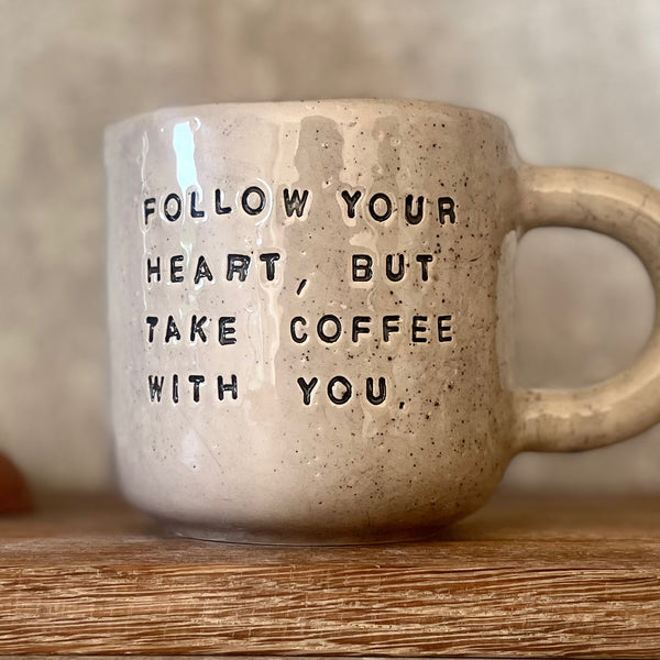 Big heavy mug with saying about coffee