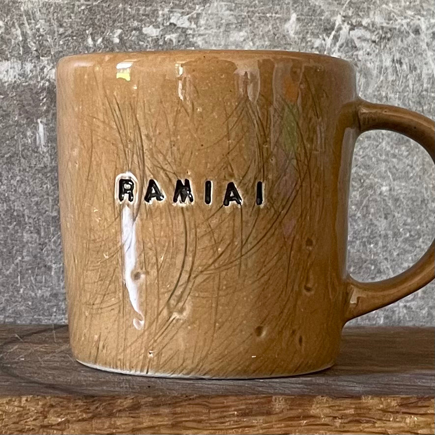 Ceramic mug with word RAMIAI