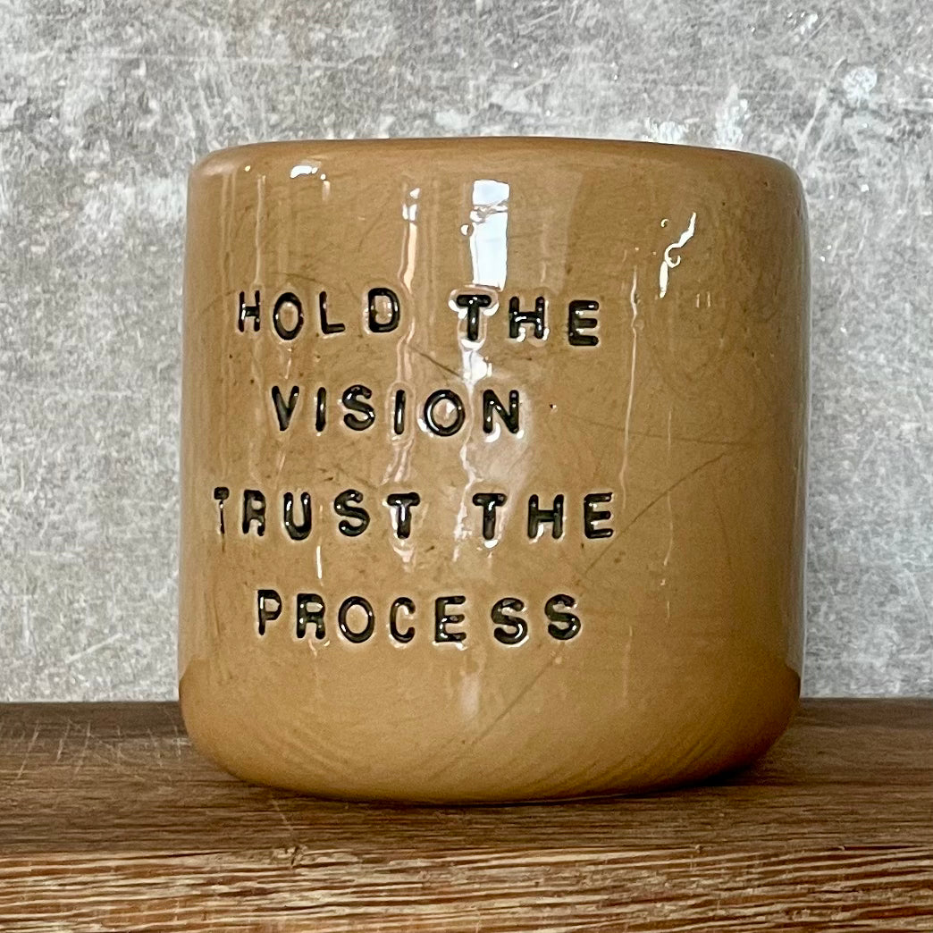 Brownish tumbler mug with inspirational words