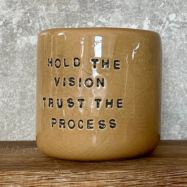 Brownish tumbler mug with inspirational words