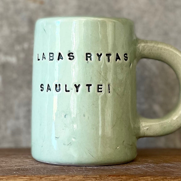 Ceramic mug with words in Lithuanian LABAS RYTAS, SAULYTE!