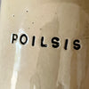 Ceramic mug with word POILSIS
