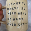 Yellowish coffee mug with funny saying