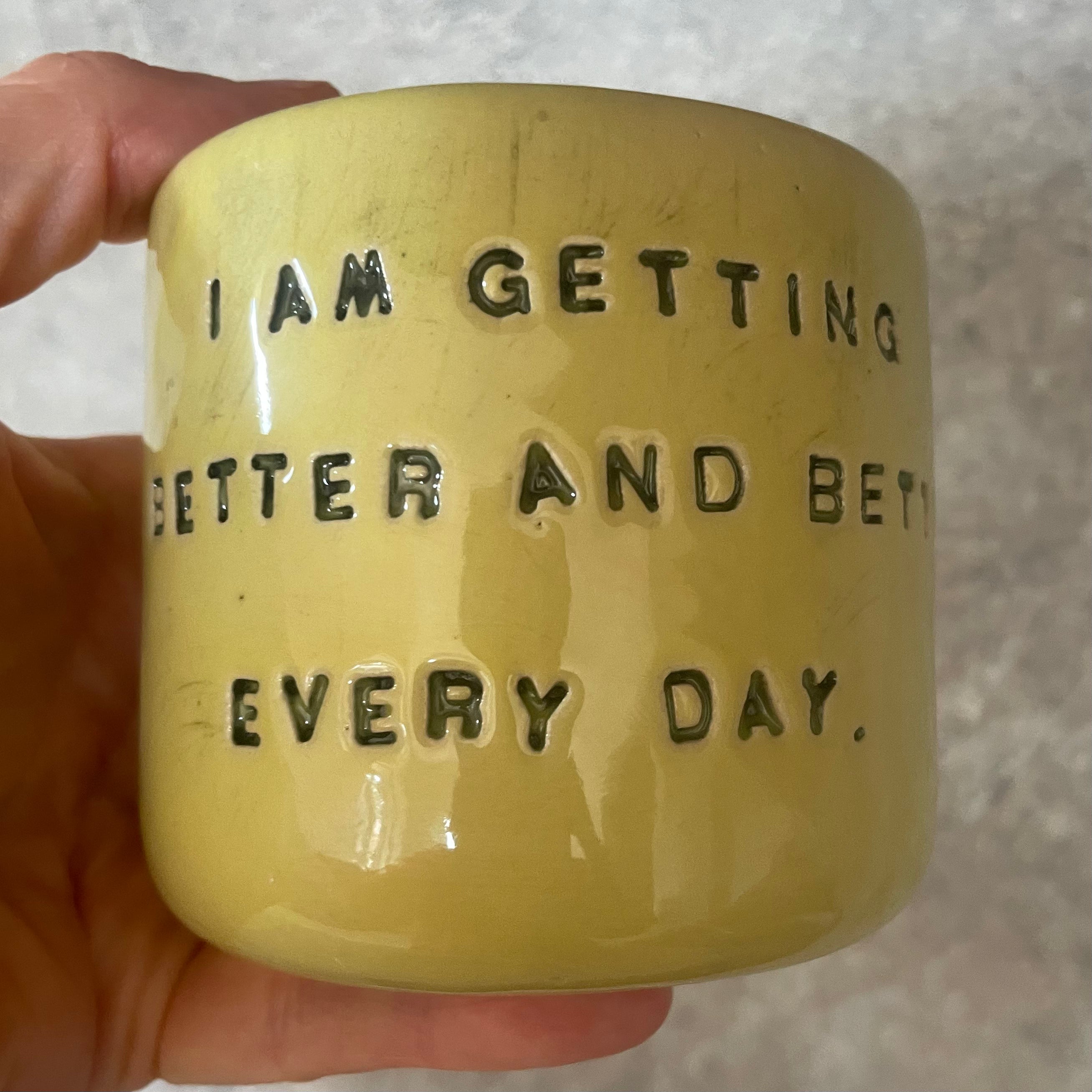 Yellow affirmation mug about healing and improving