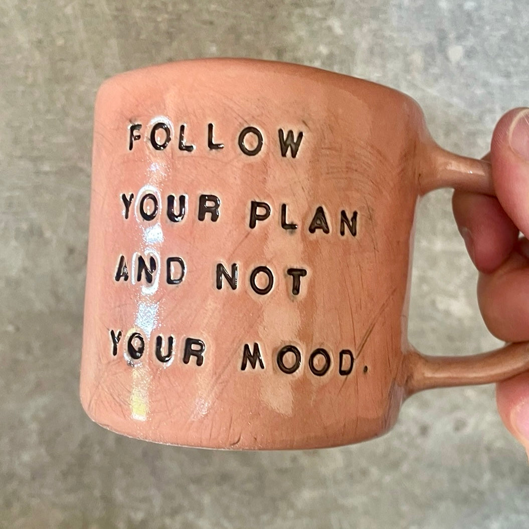 Pink mug with inspirational saying