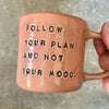 Pink mug with inspirational saying