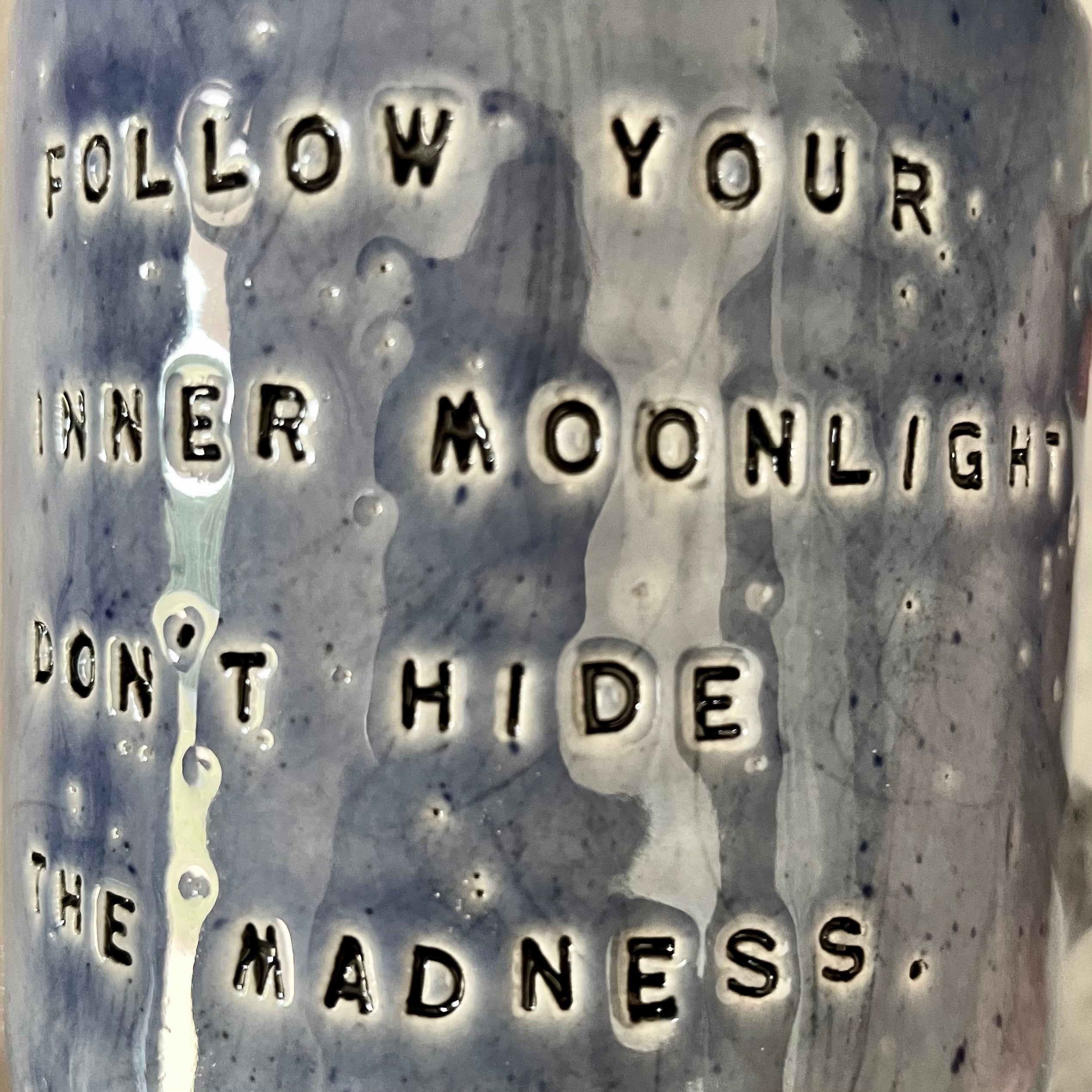 Blue ceramic coffee mug with quote